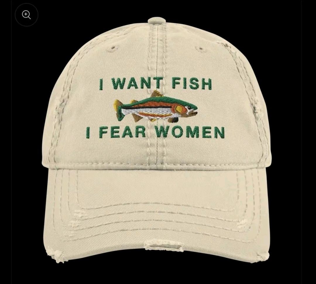 A baseball cap with the caption "I want fish; I fear women; 🐟"