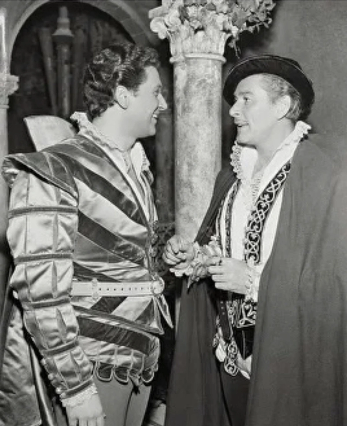 Cesare Danova and Errol Flynn on set of CROSSED SWORDS (1954)