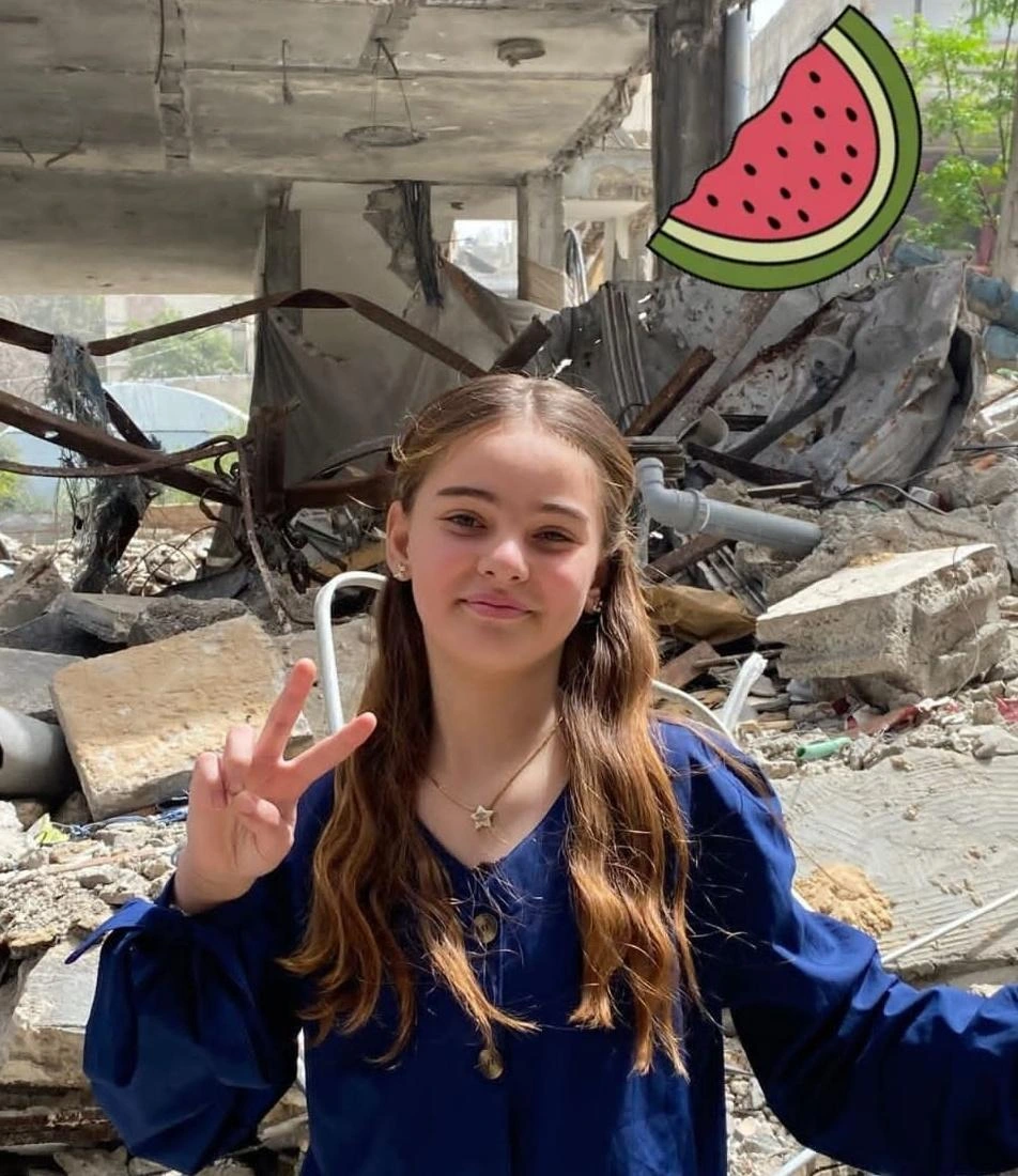 "A beautiful girl amidst the rubble of her home. Hit like if you hope for Palestine's freedom."