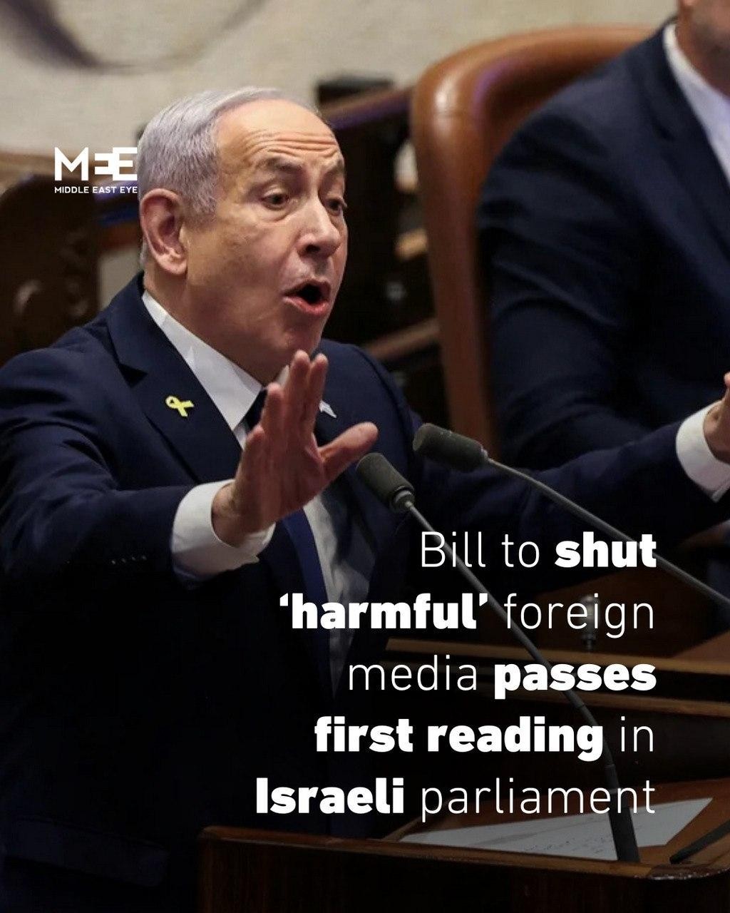 Bill to shut 'harmful' foreign media passes first reading in Israeli parliament 

with picture of Netanyahu in the background